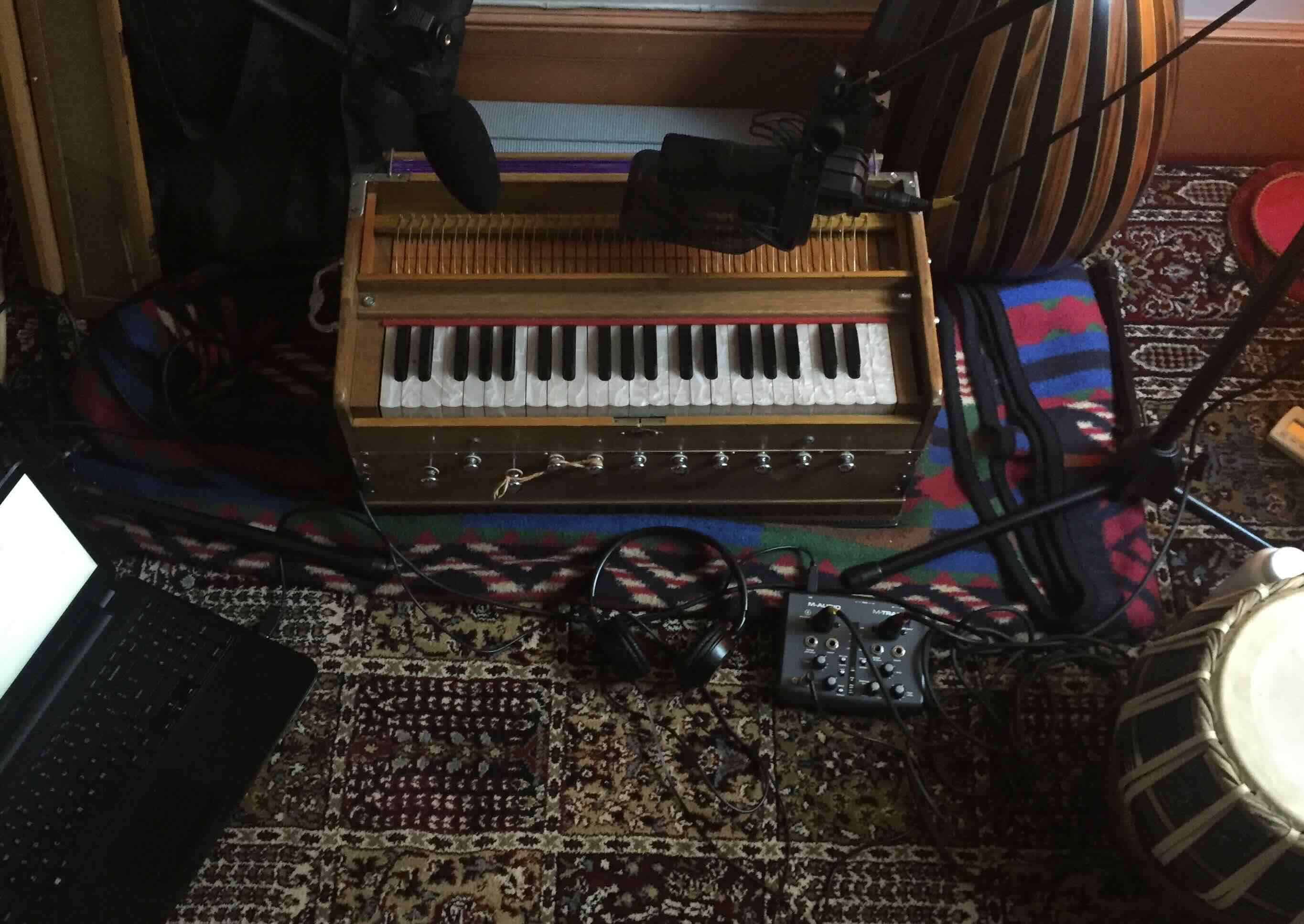 Harmonium and recording setup indoors